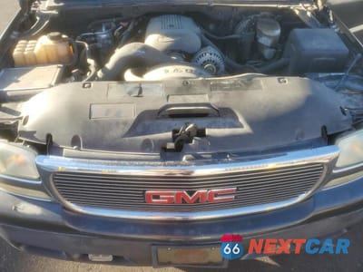 Zdjęcie 12 z 12 samochodu: 2003 GMC YUKON VIN:1GKEC13Z73R127636 - miniatura