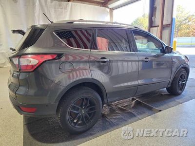 Trzecie zdjęcie samochodu z tyłu: 2018 FORD ESCAPE TITANIUM VIN:1FMCU9J92JUA63626 - miniatura