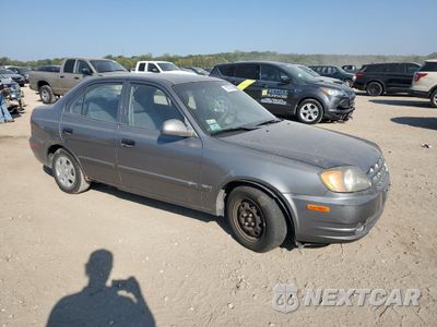 Czwarte zdjęcie samochodu z boku: 2004 HYUNDAI ACCENT GL VIN:KMHCG45C64U499903 - miniatura