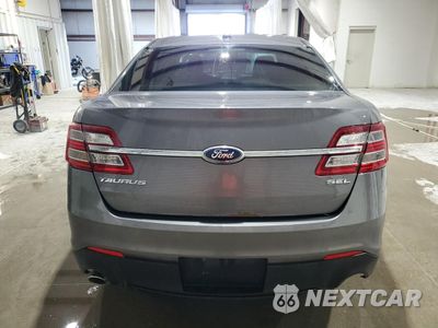 Zdjęcie 6 z 15 samochodu: 2014 FORD TAURUS SEL VIN:1FAHP2E83EG162914 - miniatura