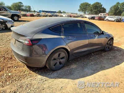 Trzecie zdjęcie samochodu z tyłu: 2022 TESLA MODEL 3 VIN:5YJ3E1EB4NF289939 - miniatura