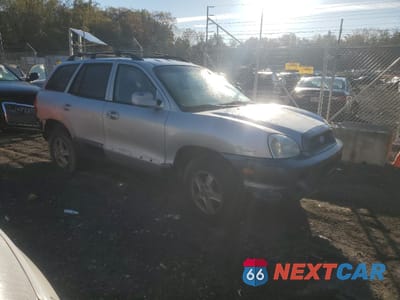 Czwarte zdjęcie samochodu z boku: 2004 HYUNDAI SANTA FE GLS VIN:KM8SC13D44U691192 - miniatura