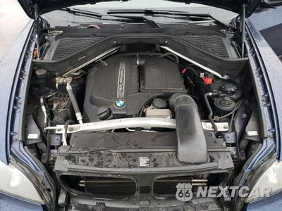 Zdjęcie 12 z 13 samochodu: 2013 BMW X5 XDRIVE35I VIN:5UXZV4C53D0E08474 - miniatura