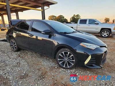 Czwarte zdjęcie samochodu z boku: 2019 TOYOTA COROLLA L VIN:5YFBURHE3KP929335 - miniatura