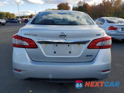 Zdjęcie 6 z 12 samochodu: 2014 NISSAN SENTRA S VIN:1N4AB7AP1EN850187 - miniatura
