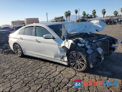 Czwarte zdjęcie samochodu z boku: 2019 BMW 530E VIN:WBAJA9C55KB388568 - miniatura