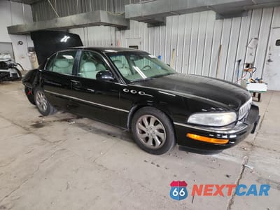 Czwarte zdjęcie samochodu z boku: 2003 BUICK PARK AVENUE ULTRA VIN:1G4CU541034174550 - miniatura