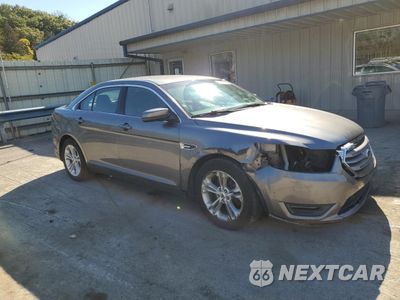 Czwarte zdjęcie samochodu z boku: 2014 FORD TAURUS SEL VIN:1FAHP2E88EG174010 - miniatura