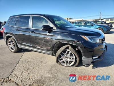 Czwarte zdjęcie samochodu z boku: 2022 HONDA PASSPORT EXL VIN:5FNYF7H54NB006693 - miniatura