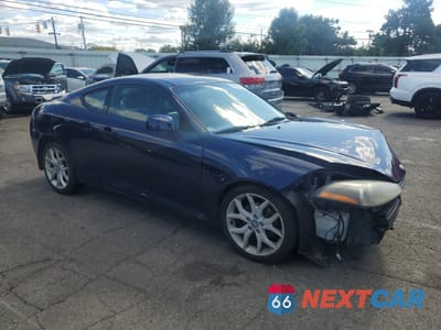 Czwarte zdjęcie samochodu z boku: 2007 HYUNDAI TIBURON GT VIN:KMHHN66F97U256039 - miniatura