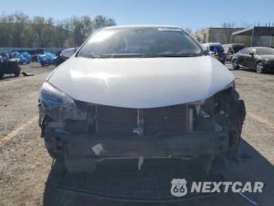 Piąte zdjęcie samochodu w środku: 2017 TOYOTA COROLLA L VIN:5YFBURHE0HP734379 - miniatura