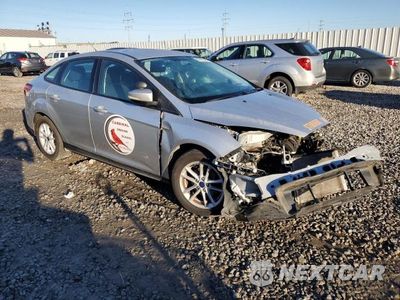 Czwarte zdjęcie samochodu z boku: 2017 FORD FOCUS SE VIN:1FADP3F20HL291848 - miniatura