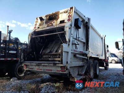 Czwarte zdjęcie samochodu z boku: 2007 INTERNATIONAL 7500 REFUSE TRUCK VIN:1HTWNAZT17J563791 - miniatura