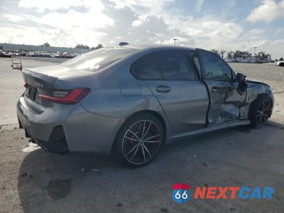 Trzecie zdjęcie samochodu z tyłu: 2023 BMW 330E VIN:3MW39FF03P8D21430 - miniatura