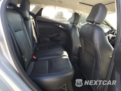 Zdjęcie 10 z 14 samochodu: 2017 FORD FOCUS TITANIUM VIN:1FADP3N26HL320464 - miniatura