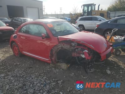 Czwarte zdjęcie samochodu z boku: 2018 VOLKSWAGEN BEETLE S VIN:3VWFD7AT2JM704938 - miniatura