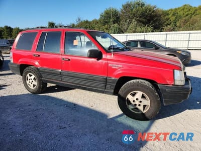 Czwarte zdjęcie samochodu z boku: 1994 JEEP GRAND CHEROKEE LAREDO VIN:1J4FX58S5RC174094 - miniatura