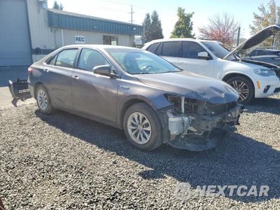 Czwarte zdjęcie samochodu z boku: 2016 TOYOTA CAMRY HYBRID VIN:4T1BD1FK6GU200343 - miniatura