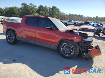 Czwarte zdjęcie samochodu z boku: 2024 RIVIAN R1T ADVENTURE VIN:7FCTGCAA6RN030101 - miniatura