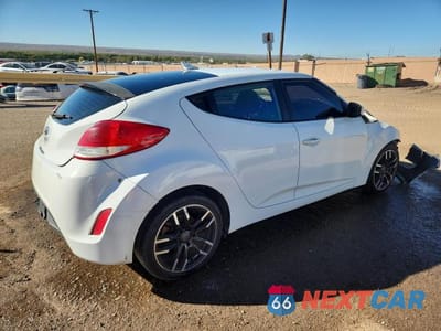 Trzecie zdjęcie samochodu z tyłu: 2014 HYUNDAI VELOSTER BASE VIN:KMHTC6AD7EU190996 - miniatura