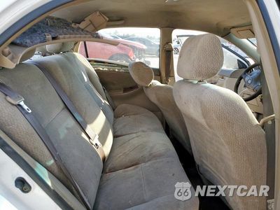 Zdjęcie 10 z 12 samochodu: 2003 TOYOTA COROLLA CE VIN:JTDBR32E632004832 - miniatura