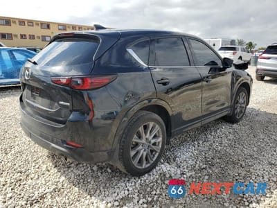 Trzecie zdjęcie samochodu z tyłu: 2024 MAZDA CX-5 PREMIUM VIN:JM3KFBDM2R0365753 - miniatura