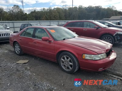 Czwarte zdjęcie samochodu z boku: 2003 CADILLAC SEVILLE STS VIN:1G6KY54963U123017 - miniatura
