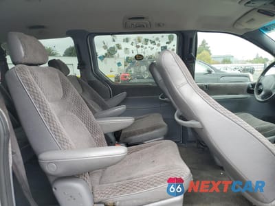 Zdjęcie 11 z 13 samochodu: 2000 DODGE GRAND CARAVAN SE VIN:2B4GP44GXYR589372 - miniatura