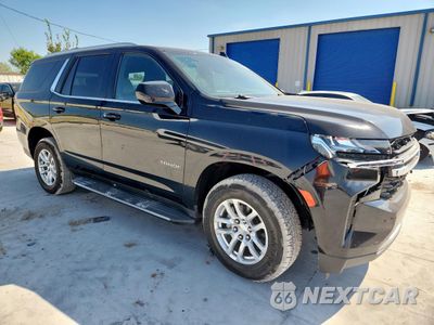 Czwarte zdjęcie samochodu z boku: 2021 CHEVROLET TAHOE C1500 LT VIN:1GNSCNKD1MR267461 - miniatura