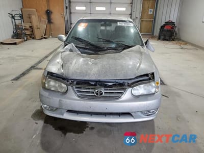 Piąte zdjęcie samochodu w środku: 2001 TOYOTA COROLLA S VIN:2T1BR12E91C499160 - miniatura