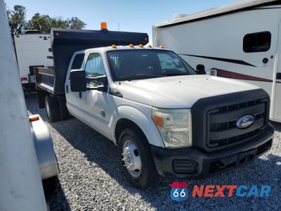 Czwarte zdjęcie samochodu z boku: 2011 FORD F350 SUPER DUTY VIN:1FD8W3GT3BEA42313 - miniatura