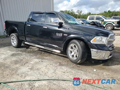 Czwarte zdjęcie samochodu z boku: 2015 RAM 1500 LARAMIE VIN:1C6RR6VT2FS565180 - miniatura