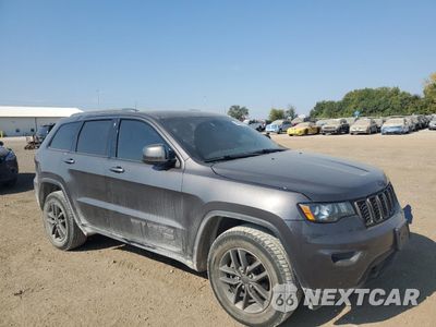 Czwarte zdjęcie samochodu z boku: 2016 JEEP GRAND CHEROKEE LAREDO VIN:1C4RJFAG8GC470174 - miniatura