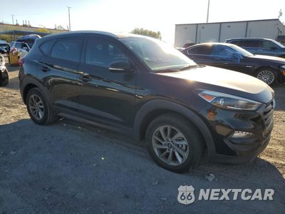 Czwarte zdjęcie samochodu z boku: 2016 HYUNDAI TUCSON LIMITED VIN:KM8J33A28GU140003 - miniatura