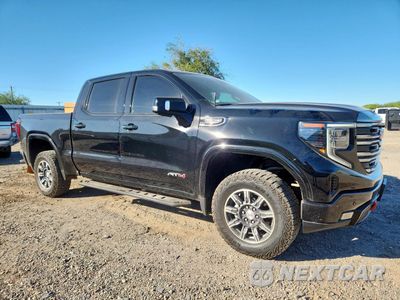 Czwarte zdjęcie samochodu z boku: 2024 GMC SIERRA K1500 AT4 VIN:3GTUUEEL8RG177684 - miniatura