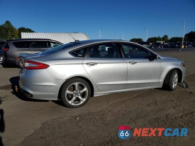 Trzecie zdjęcie samochodu z tyłu: 2016 FORD FUSION SE VIN:3FA6P0T9XGR154151 - miniatura