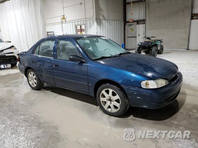 Czwarte zdjęcie samochodu z boku: 2001 CHEVROLET GEO PRIZM BASE VIN:1Y1SK52841Z425300 - miniatura