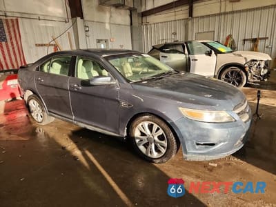 Czwarte zdjęcie samochodu z boku: 2010 FORD TAURUS SEL VIN:1FAHP2HW9AG130778 - miniatura