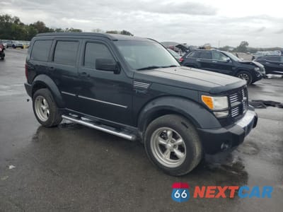 Czwarte zdjęcie samochodu z boku: 2011 DODGE NITRO HEAT VIN:1D4PT4GK3BW603581 - miniatura