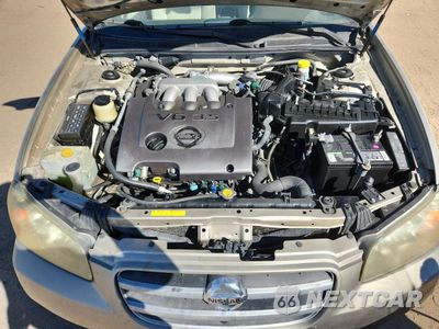 Zdjęcie 11 z 12 samochodu: 2002 NISSAN MAXIMA GLE VIN:JN1DA31D72T433904 - miniatura