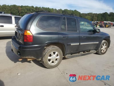 Trzecie zdjęcie samochodu z tyłu: 2004 GMC ENVOY VIN:1GKDS13S942101129 - miniatura