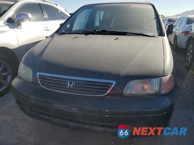 Piąte zdjęcie samochodu w środku: 1997 HONDA ODYSSEY EX VIN:JHMRA1875VC007073 - miniatura