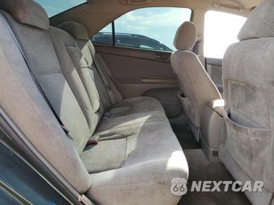 Zdjęcie 10 z 11 samochodu: 2004 TOYOTA CAMRY LE VIN:4T1BE32K24U351285 - miniatura
