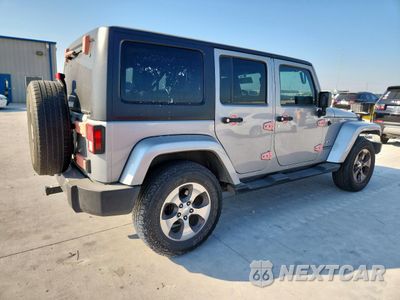 Trzecie zdjęcie samochodu z tyłu: 2017 JEEP WRANGLER UNLIMITED SAHARA VIN:1C4HJWEG2HL668501 - miniatura