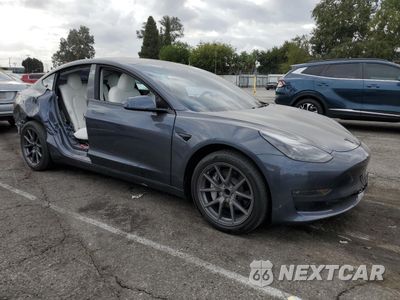 Czwarte zdjęcie samochodu z boku: 2023 TESLA MODEL 3 VIN:5YJ3E1EA7PF561698 - miniatura
