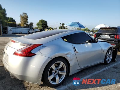 Trzecie zdjęcie samochodu z tyłu: 2012 NISSAN 370Z BASE VIN:JN1AZ4EH8CM565208 - miniatura