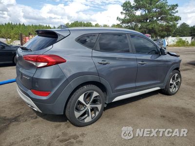 Trzecie zdjęcie samochodu z tyłu: 2017 HYUNDAI TUCSON LIMITED VIN:KM8J33A28HU414785 - miniatura