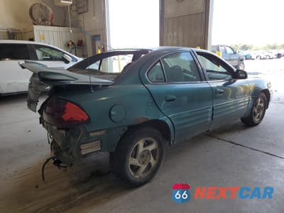 Trzecie zdjęcie samochodu z tyłu: 1999 PONTIAC GRAND AM SE VIN:1G2NE52T0XM701933 - miniatura