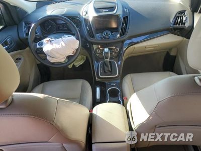 Zdjęcie 8 z 13 samochodu: 2014 FORD ESCAPE TITANIUM VIN:1FMCU0JX5EUA50661 - miniatura