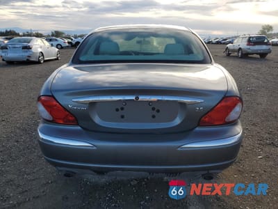 Zdjęcie 6 z 12 samochodu: 2002 JAGUAR X-TYPE 2.5 VIN:SAJEA51DX2XC80042 - miniatura